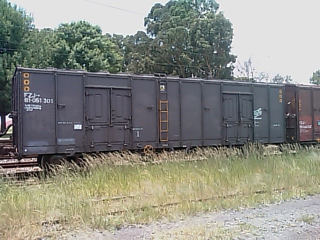 One of 22 grain cars on a 37 car train waiting at Redan 081230 at 1200 DOWNLOAD larger version here